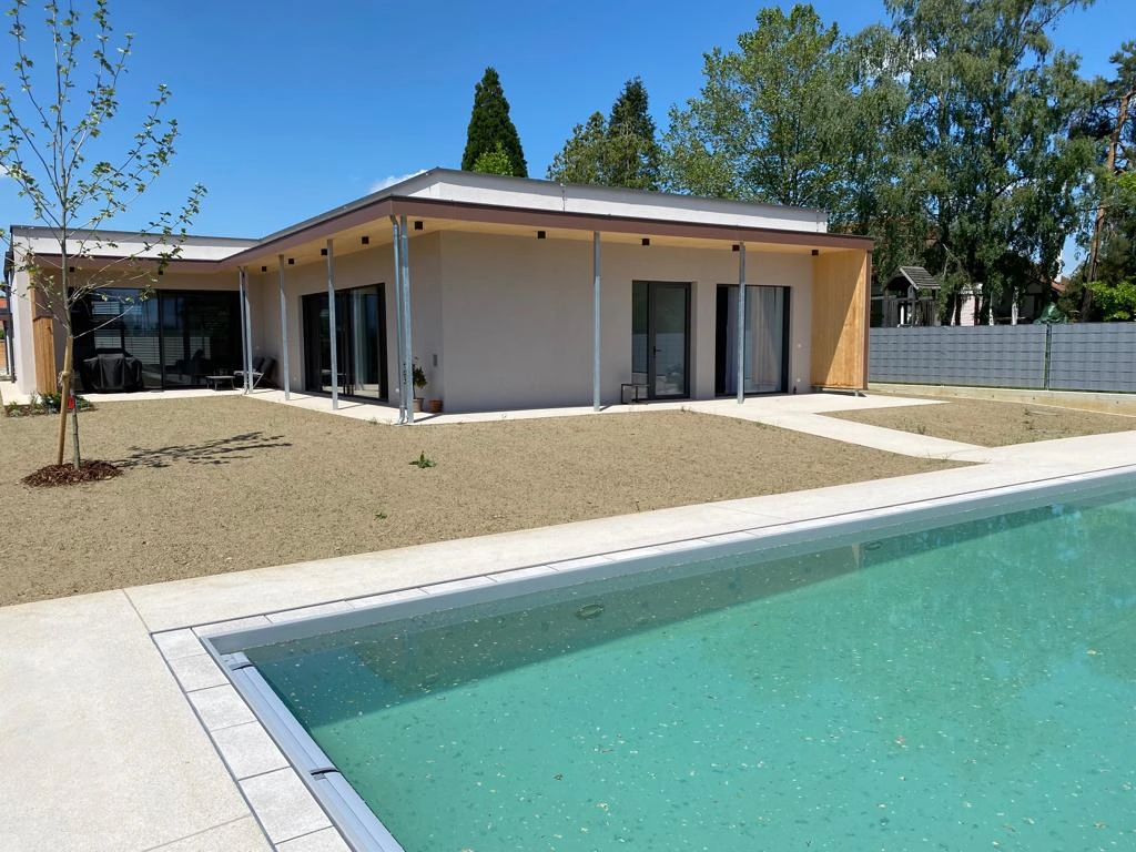 Bagger Wien – EMK Erdbau GmbH – Einfamilienhaus – Poolbau – Gartengestaltung Poolbau und Gartengestaltung durch die EMK Erdbau GmbH